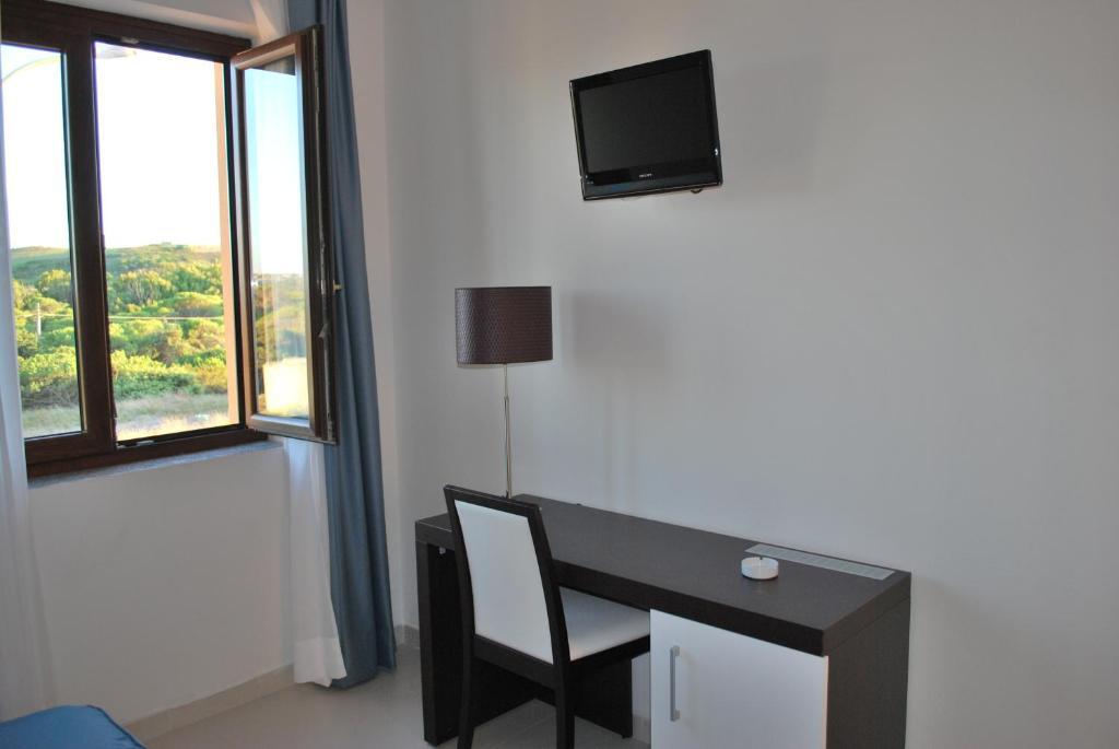 Buddi Hotel Platamona Chambre photo