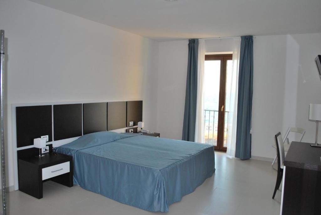 Buddi Hotel Platamona Chambre photo