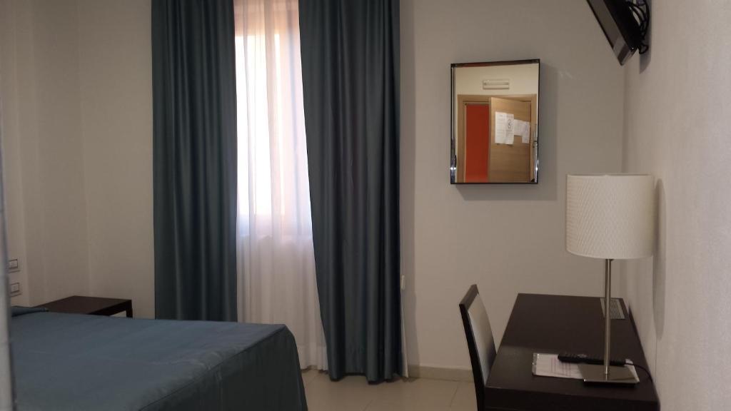 Buddi Hotel Platamona Chambre photo
