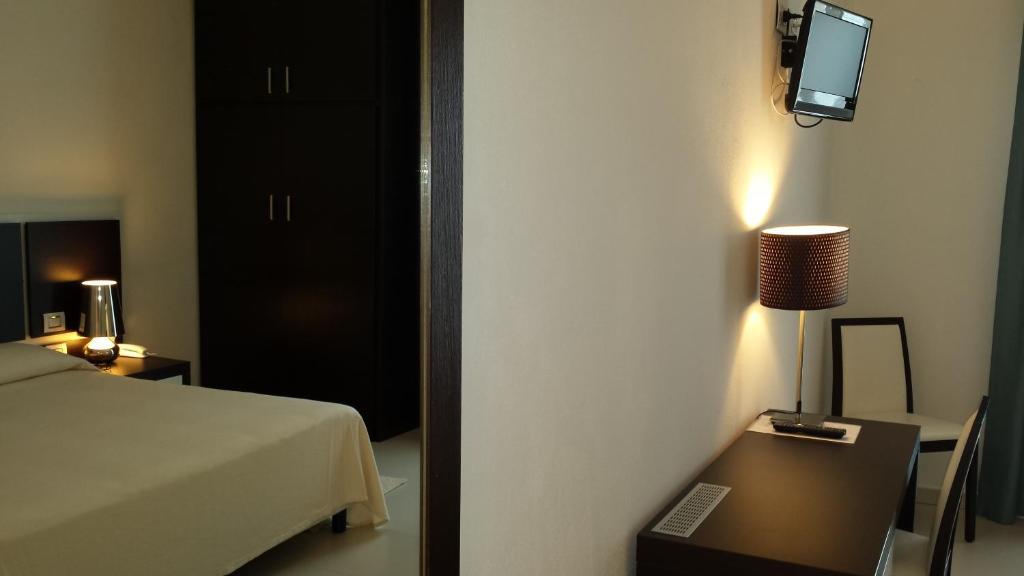 Buddi Hotel Platamona Chambre photo