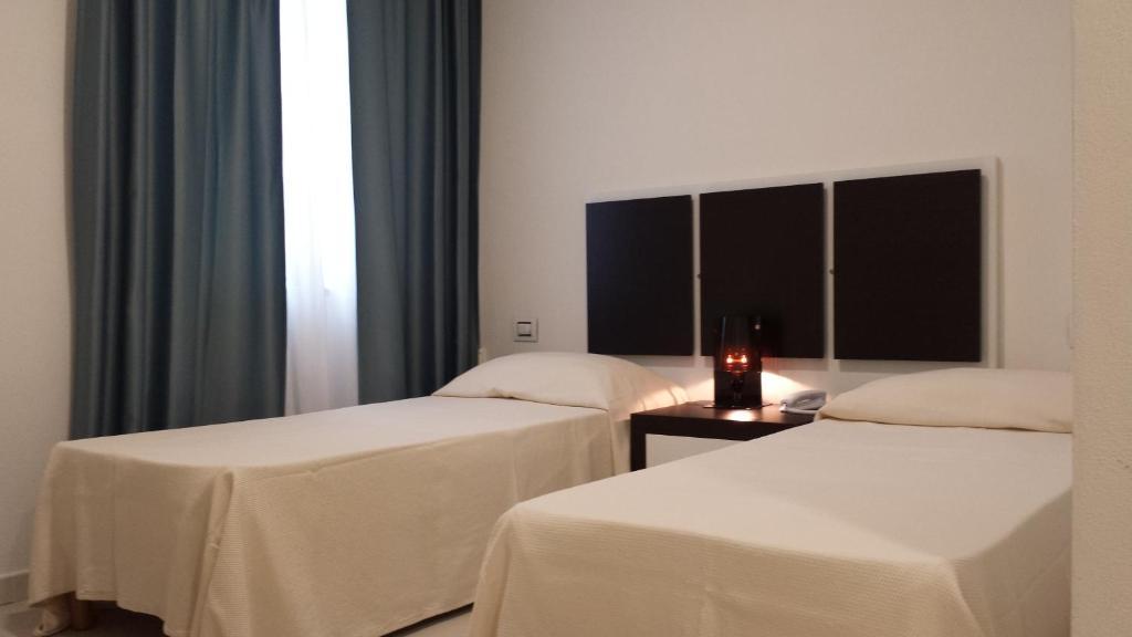 Buddi Hotel Platamona Chambre photo